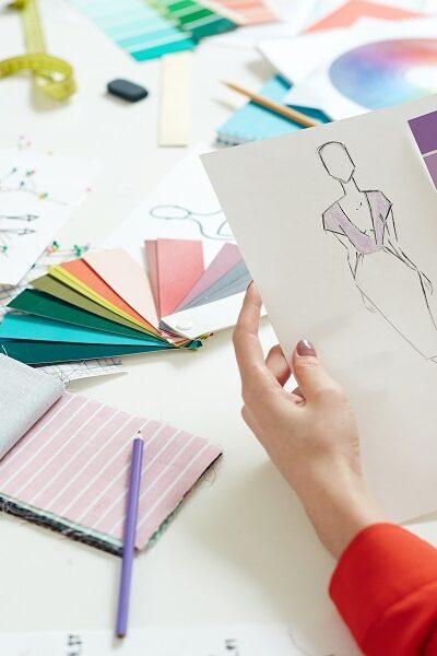 What is the difference between fashion design program and retail management courses?